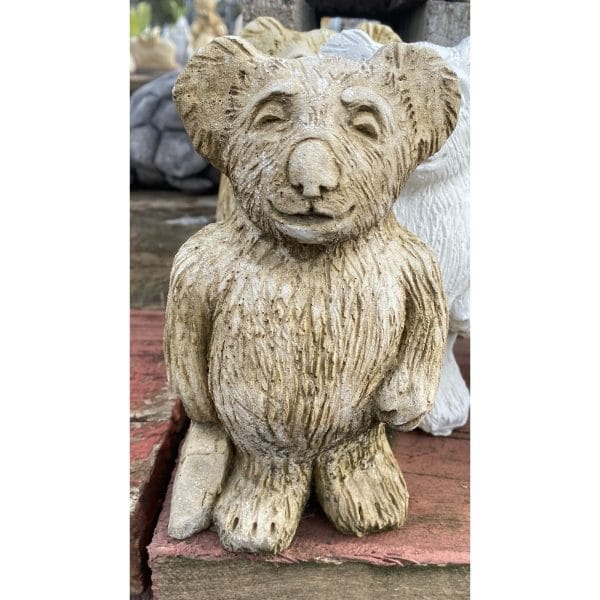 Bear with Bag Concrete Statue