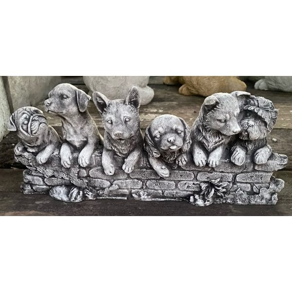 Six Doggies on a Fence Concrete Dog Statue